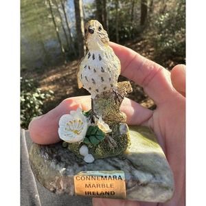 Bird Sitting on Piece of Connemara Marble from Ireland Marked EPL -S89